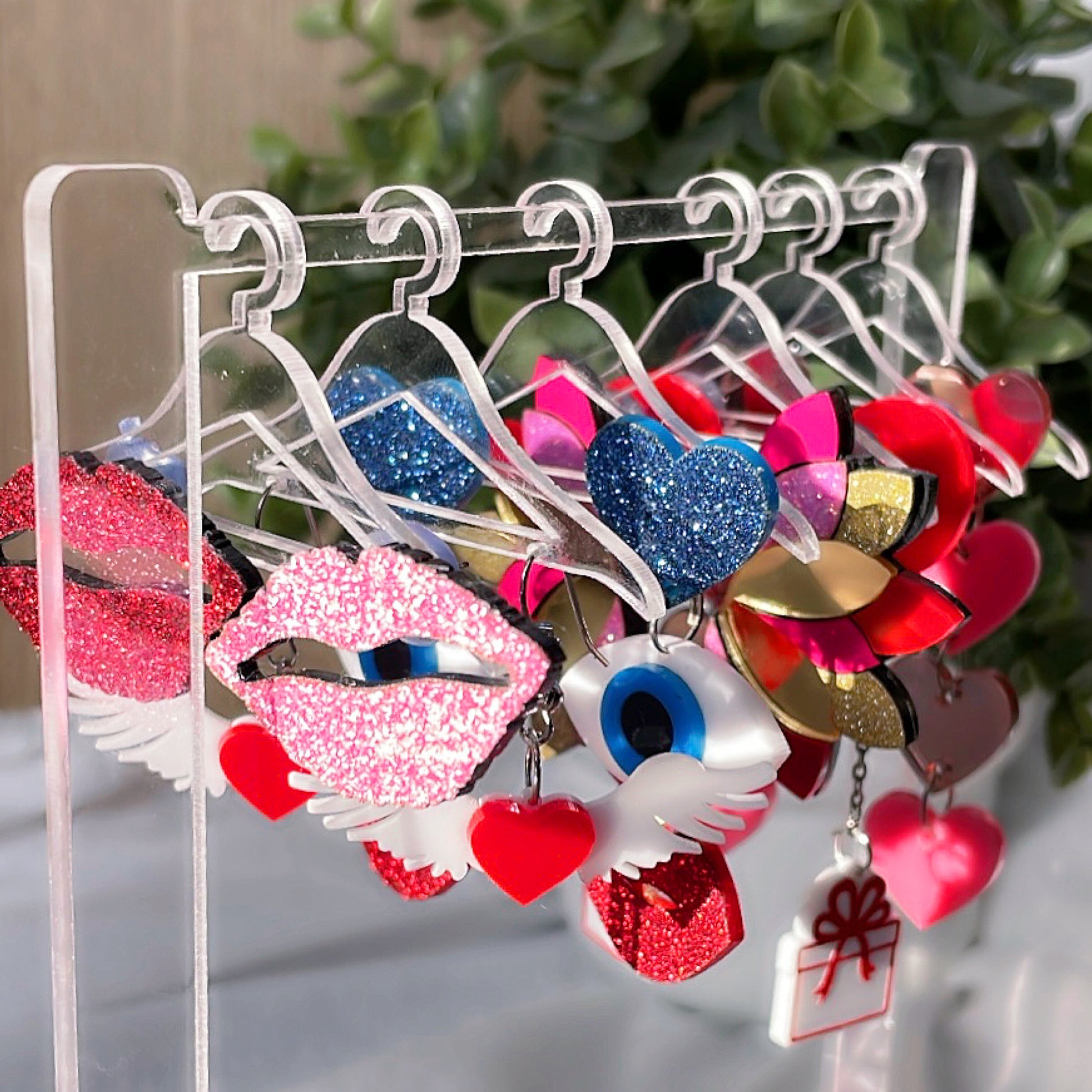 Earrings Hangars (Set of 6) - Transparent - Nian by Nidhi - placed with their parent product - The Hanging Jewellery Organiser, and 6 different earrings from Nian by Nidhi